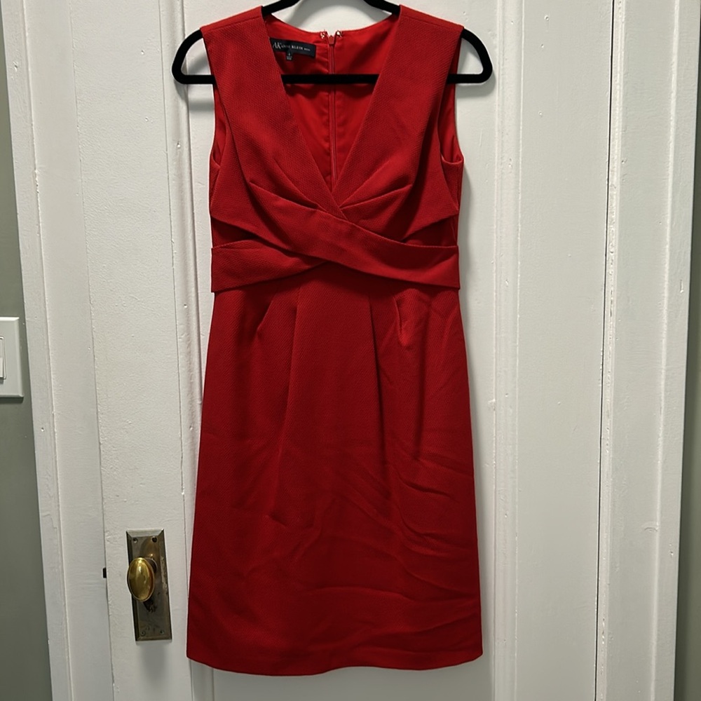 A timeless red dress that is fully lined.